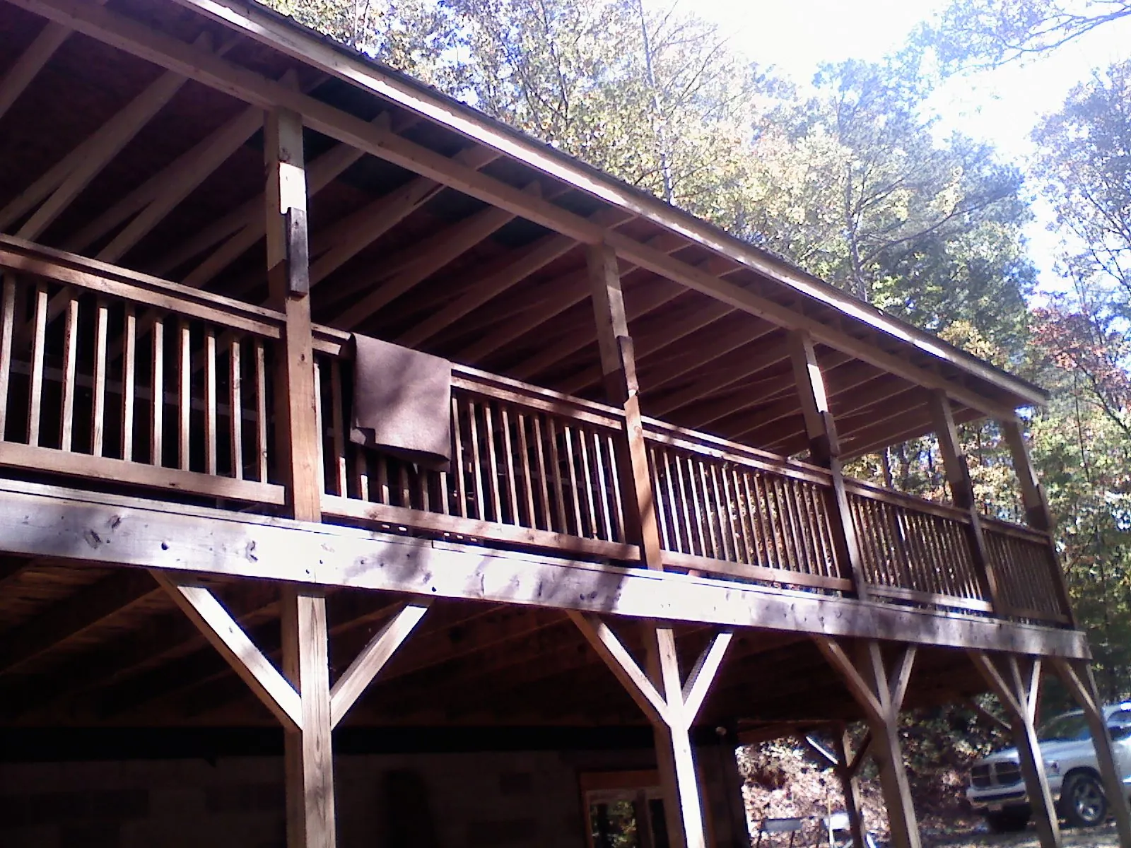 Timber framing under a new elevated porch and deck — Roof Leak Repair in Almira by Roofing Brothers